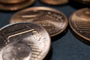 Ein Cent Stück für den geringen Wert beim Lebensversicherung kündigen