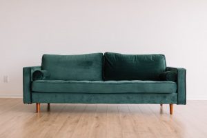 Grünes Sofa gekauft über Rahmenkredit